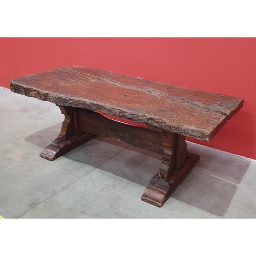 483 - An old rustic oak Refectory Table with very thick top on later trestle base with stout square suppor... 