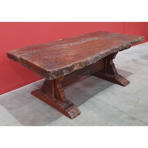 483 - An old rustic oak Refectory Table with very thick top on later trestle base with stout square suppor... 