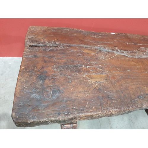 483 - An old rustic oak Refectory Table with very thick top on later trestle base with stout square suppor... 