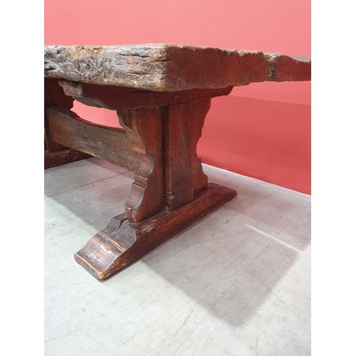 483 - An old rustic oak Refectory Table with very thick top on later trestle base with stout square suppor... 