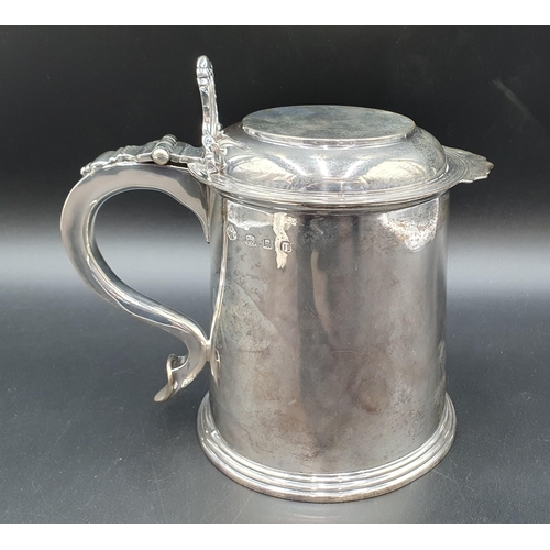 101 - A George V silver Quart Tankard inscribed on base 