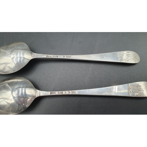 11 - Two Georgian silver bottom marked Table Spoons Hanoverian pattern engraved crests, London 1778, and ... 