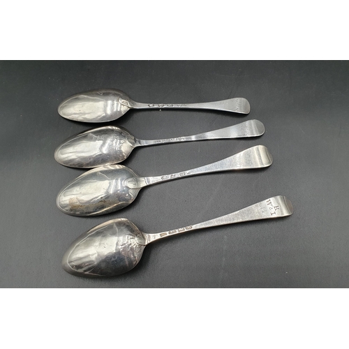 110 - Four Georgian silver bottom marked table Spoons Hanoverian pattern, London 1740, 1743, 1773, etc