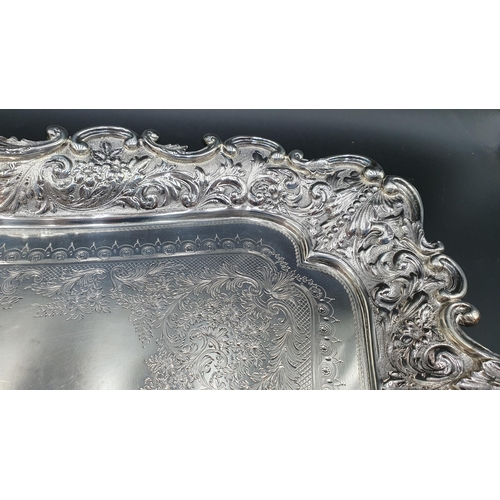 117 - An Edward VII silver two handled Tea Tray with engraved Presentation Inscription dated 1913, floral ... 