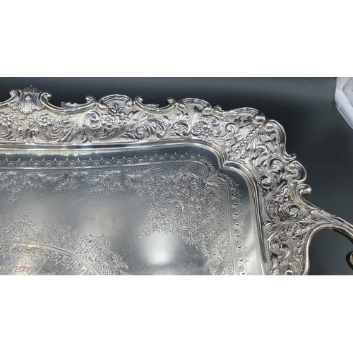 117 - An Edward VII silver two handled Tea Tray with engraved Presentation Inscription dated 1913, floral ... 