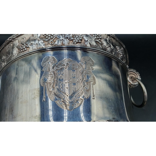 119 - A George III silver Wine Cooler with fruiting vine friezes, leafage scroll and ring handles, semi-ga... 