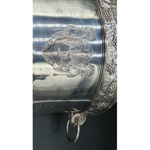 119 - A George III silver Wine Cooler with fruiting vine friezes, leafage scroll and ring handles, semi-ga... 