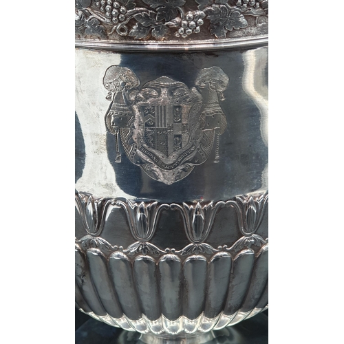 119 - A George III silver Wine Cooler with fruiting vine friezes, leafage scroll and ring handles, semi-ga... 