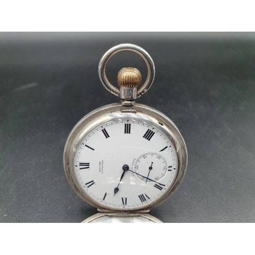 152 - A Baume Longines silver cased Hunter Pocket Watch with white enamel dial and subsidiary seconds dial... 