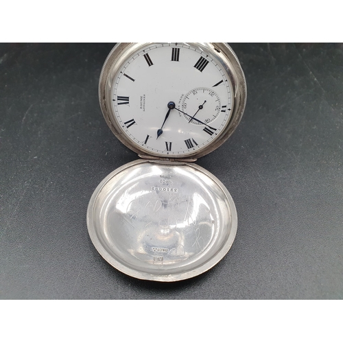 152 - A Baume Longines silver cased Hunter Pocket Watch with white enamel dial and subsidiary seconds dial... 