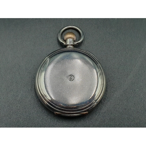 152 - A Baume Longines silver cased Hunter Pocket Watch with white enamel dial and subsidiary seconds dial... 