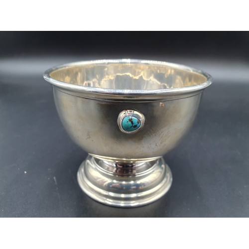 20 - An Edward VII Cymric silver Arts and Crafts circular Bowl inset three Ruskin type turquoise cabochon... 