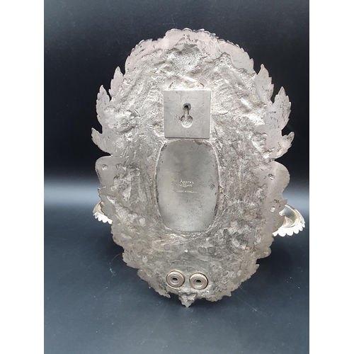 22 - An Elizabeth II silver two branch Wall Sconce inscribed 