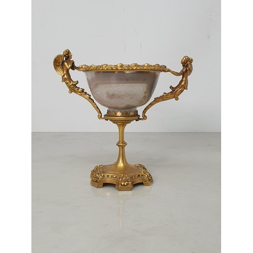 251 - A 19th Century agate Pedestal Bowl with gilded metal handles in the form of an angel and fairy, with... 