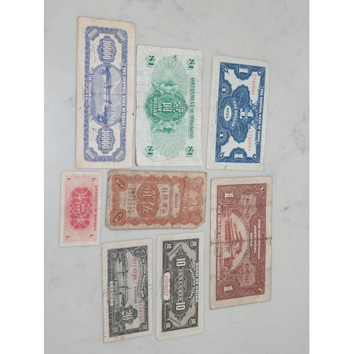 253 - A small collection of Chinese and Hong Kong Banknotes to include a Bank of China 1925 50 Cents and 1... 