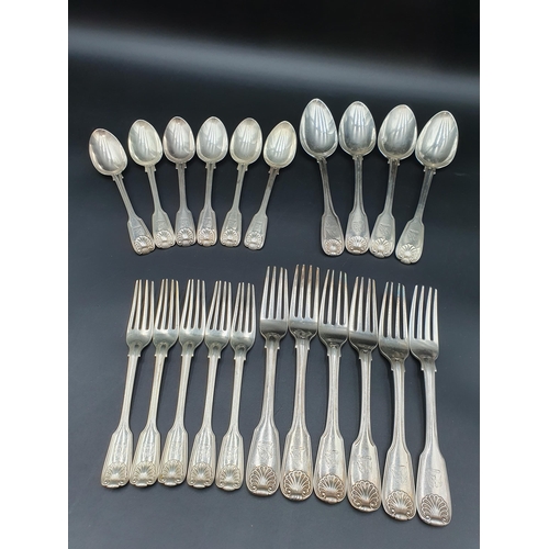 28 - A matched part set of 19th Century silver Cutlery fiddle, thread and shell pattern engraved eagle cr... 