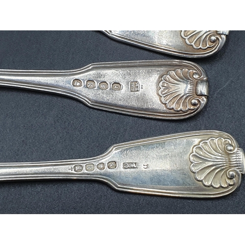 28 - A matched part set of 19th Century silver Cutlery fiddle, thread and shell pattern engraved eagle cr... 