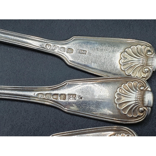 28 - A matched part set of 19th Century silver Cutlery fiddle, thread and shell pattern engraved eagle cr... 