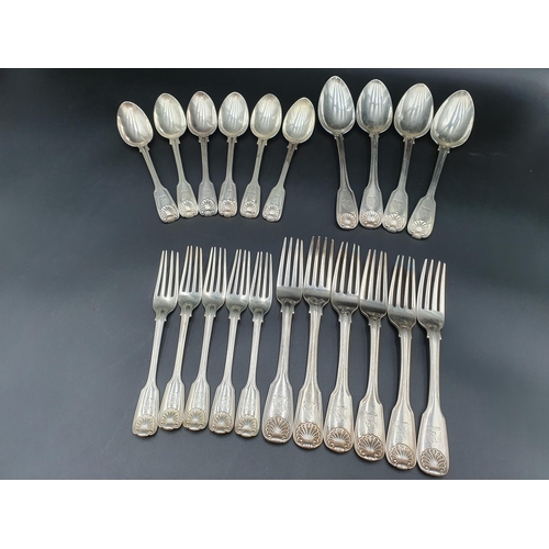 28 - A matched part set of 19th Century silver Cutlery fiddle, thread and shell pattern engraved eagle cr... 