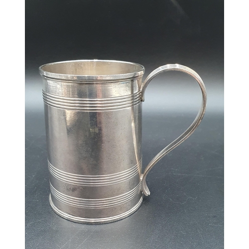 3 - A George III silver Mug with reeded bands and handle, London 1801, maker: John Emes, 212gms