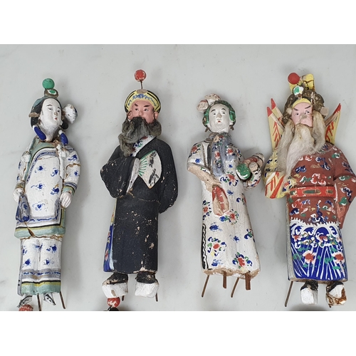 309 - Nine antique Chinese clay Dolls with moving heads dressed in traditional costume, some A/F 6in H app... 