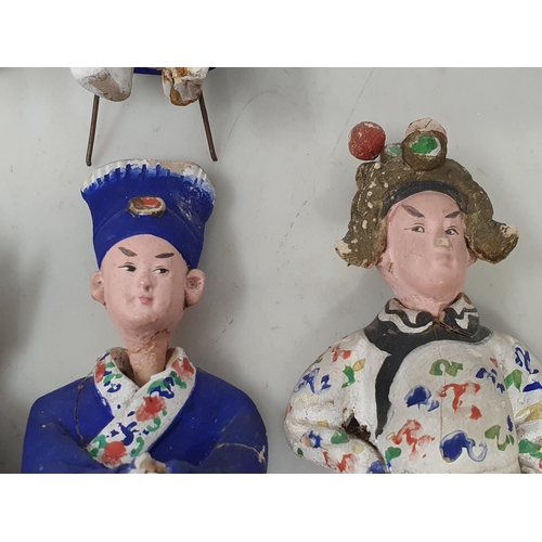 309 - Nine antique Chinese clay Dolls with moving heads dressed in traditional costume, some A/F 6in H app... 