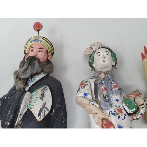 309 - Nine antique Chinese clay Dolls with moving heads dressed in traditional costume, some A/F 6in H app... 