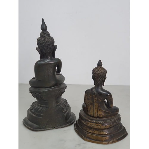 310 - A bronze Buddha in the seated position on decorative base, 6