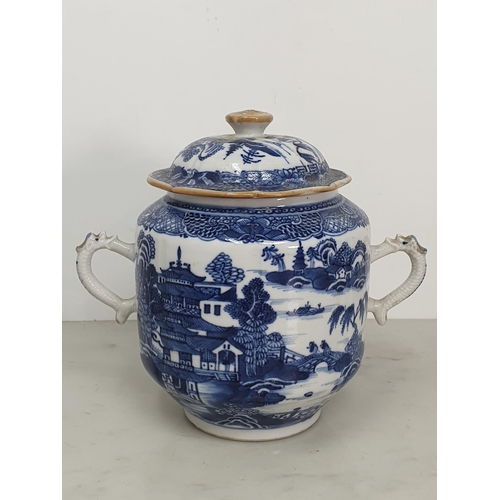 315 - A Chinese Export blue and white two handled Lidded Jar and Cover, decorated with Pagoda in landscape... 