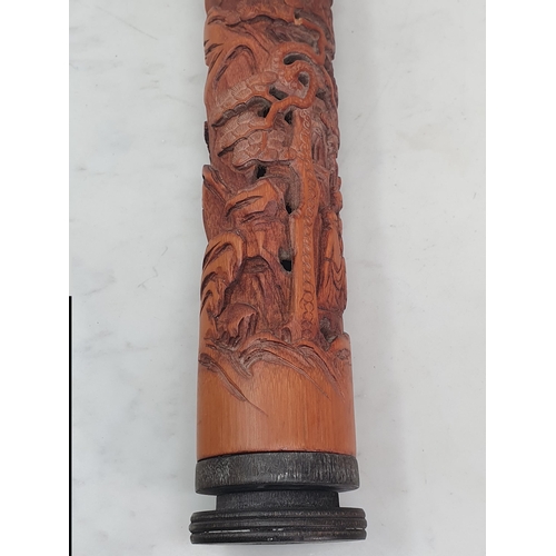 316 - A 20th Century carved and pierced Bamboo Incense Burner decorated with figures in landscapes, 11.5