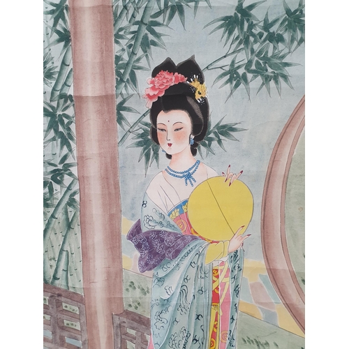 322 - A 20th Century Chinese Wall Hanging in watercolour depicting a standing Female in dress on a balcony... 