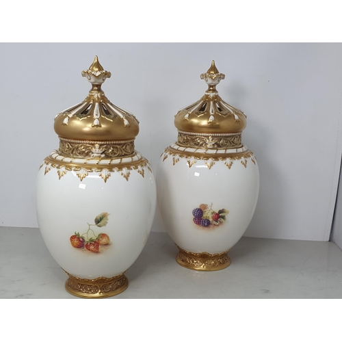 359 - A pair of Royal Worcester Pot Pourri lidded Vases with inner cover and outer lid having pierced deco... 