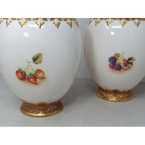 359 - A pair of Royal Worcester Pot Pourri lidded Vases with inner cover and outer lid having pierced deco... 