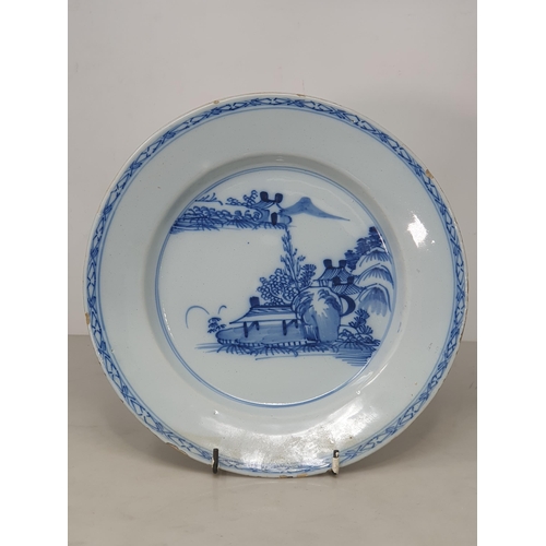 369 - Four Antique Delft blue and white Plates with painted landscapes, figures, etc.