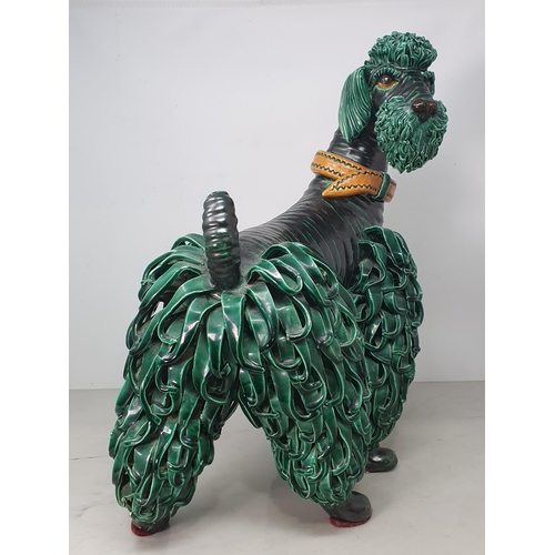 370 - A large Continental green glazed Pottery Poodle with simulated leather collar, 1ft 5