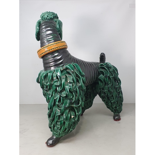 370 - A large Continental green glazed Pottery Poodle with simulated leather collar, 1ft 5