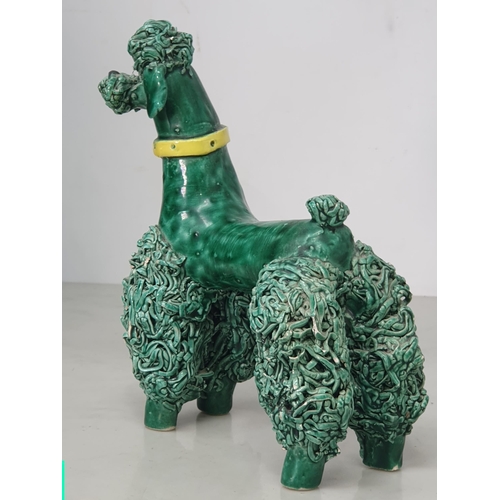 370 - A large Continental green glazed Pottery Poodle with simulated leather collar, 1ft 5