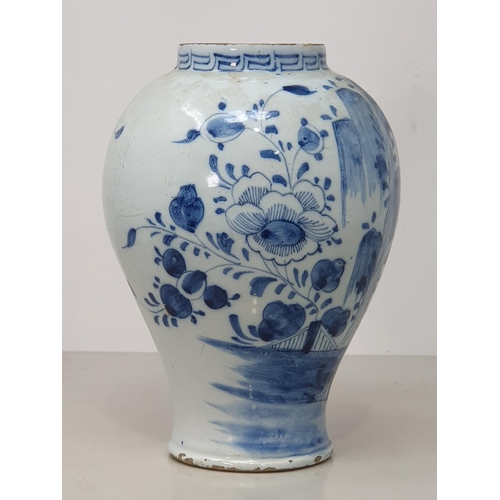 371 - An Antique blue and white Delft Baluster Vase, with Greek key style frieze, and floral and willow pa... 