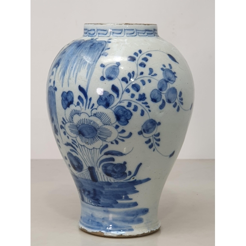 371 - An Antique blue and white Delft Baluster Vase, with Greek key style frieze, and floral and willow pa... 