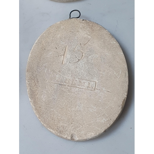 379 - Thirty Georgian relief moulded oval plater Plaques depicting nobility, 2 7/8 in, stamped P. Bemi to ... 