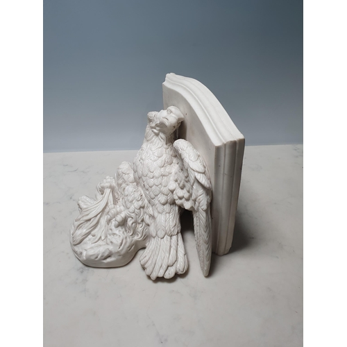 380 - A Parian ware Wall Bracket in the form of an eagle supporting a shelf, 9 1/2in