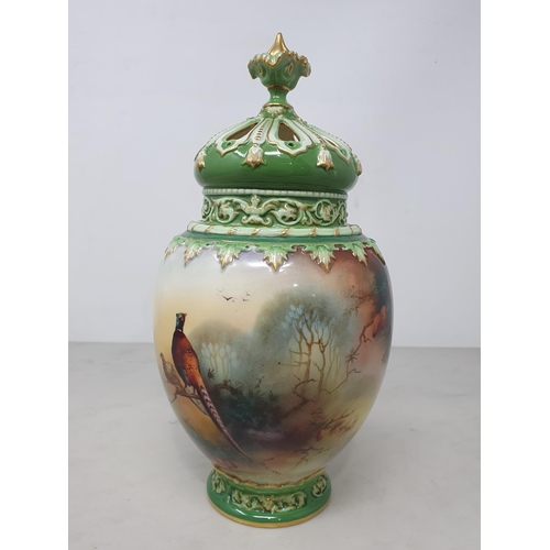 383 - A Royal Worcester Pot Pourri Vase having inner and outer covers, painted with Pheasant figures in a ... 