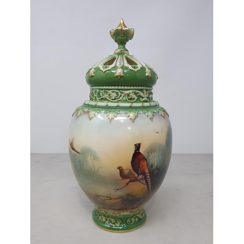 383 - A Royal Worcester Pot Pourri Vase having inner and outer covers, painted with Pheasant figures in a ... 