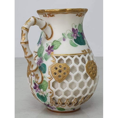 386 - A Kerr and Binns Worcester Jug with painted floral band with great tit on branch, double wall with g... 