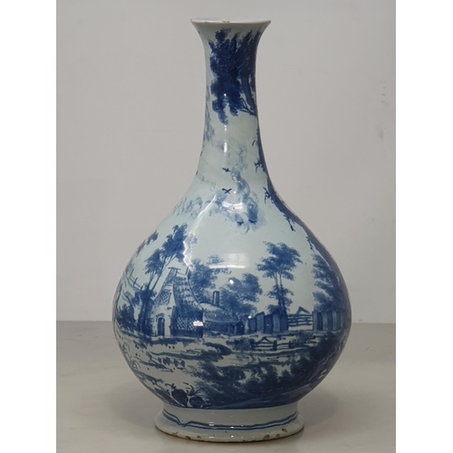 395 - An antique blue and white Delftware Vase, decorated with figures in Landscape with ornate Tree. 10.5... 