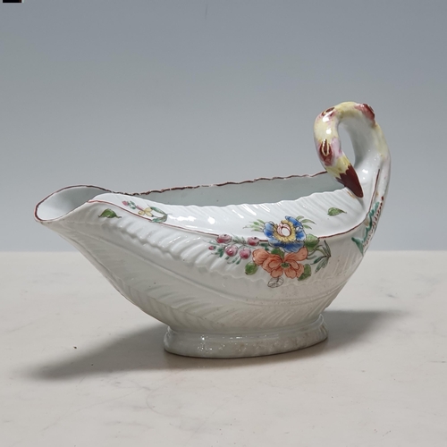 400 - A Worcester Sauce Boat in the form of cos lettuce, painted coloured floral and leafage designs to th... 