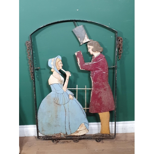 413 - An antique Folk Art Pub Sign with carved figures of a Gentleman and Lady A/F within a metal frame 3f... 