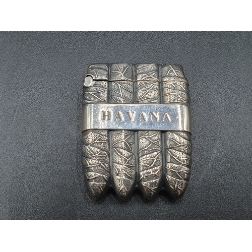 44 - A sterling silver Havana Vesta Case in the form of a cigar case with tobacco leaf decoration, marked... 