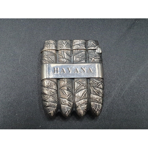 44 - A sterling silver Havana Vesta Case in the form of a cigar case with tobacco leaf decoration, marked... 