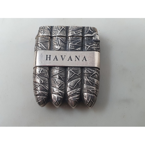 44 - A sterling silver Havana Vesta Case in the form of a cigar case with tobacco leaf decoration, marked... 